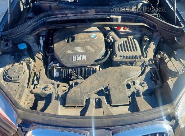 WBXHU7C37H5H36864 2017 BMW X1 Gray Engine compartment view