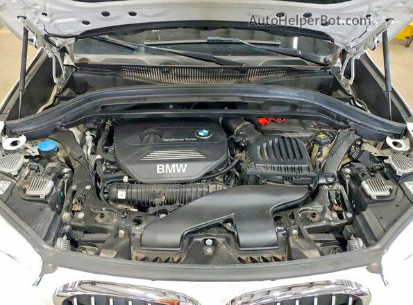 WBXHU7C37J5L09073 2018 BMW X1 White Engine compartment view