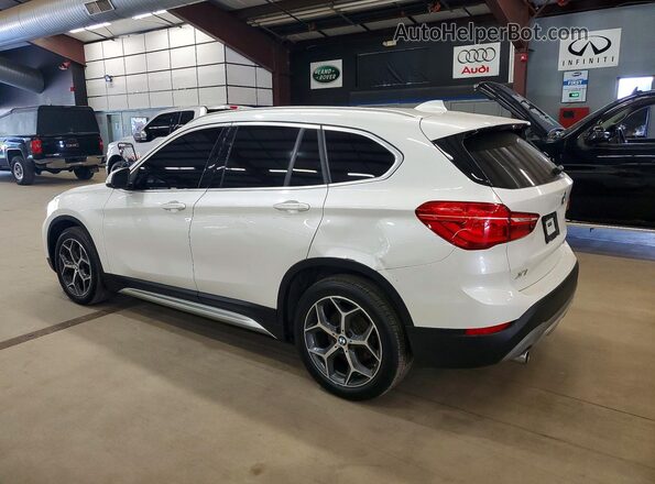 WBXHU7C37J5L09073 2018 BMW X1 White Rear left
