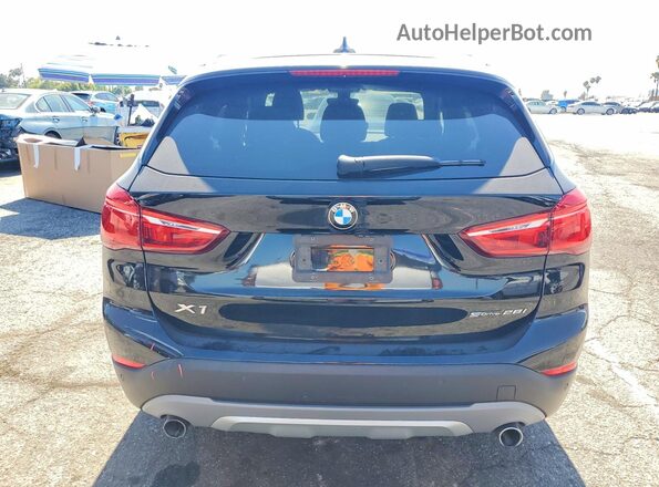 WBXHU7C38J3H42447 2018 BMW X1 Black Вид ззаду