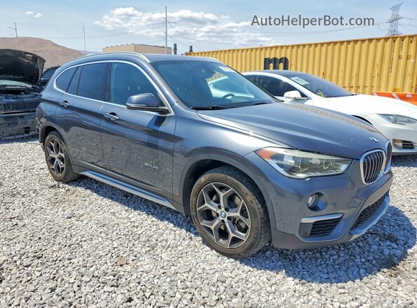 WBXHU7C39H5H33349 2017 BMW X1 Gray Delantero derecho