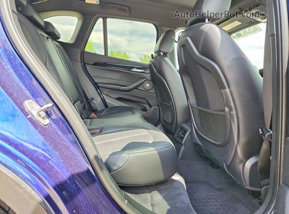 WBXHU7C39J3F04607 2018 BMW X1 Blue უკანა სალონის ხედი