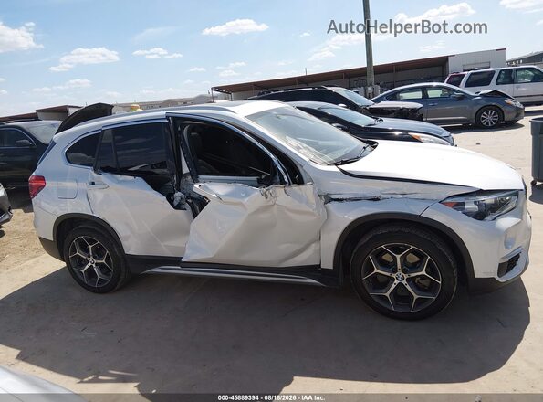WBXHU7C39J3H43137 2018 BMW X1 White ხელსაწყოთა პანელის ხედი