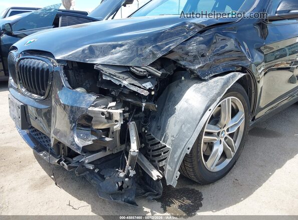 WBXHU7C39J5L05770 2018 BMW X1 Black Вид спереду