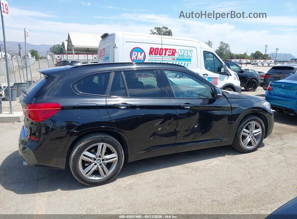 WBXHU7C39J5L05770 2018 BMW X1 Black Вид задньої частини салону