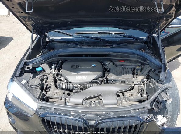 WBXHU7C39J5L05770 2018 BMW X1 Black Вид ззаду