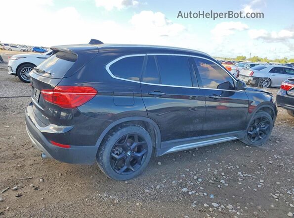 WBXHU7C52K5L10618 2019 BMW X1 Black Delantero derecho