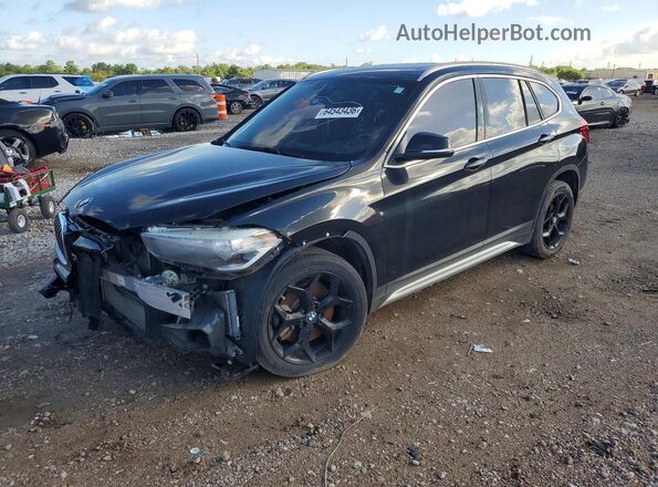 WBXHU7C52K5L10618 2019 BMW X1 Black Trasero izquierdo