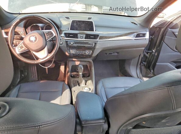 WBXHU7C52K5L10618 2019 BMW X1 Black Vista del cuadro de instrumentos