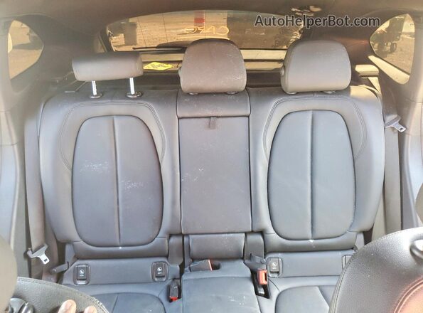 WBXHU7C52K5L10618 2019 BMW X1 Black Vista interior trasera