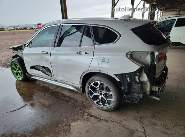 WBXHU7C5XK5L11662 2019 BMW X1 White Tył lewy