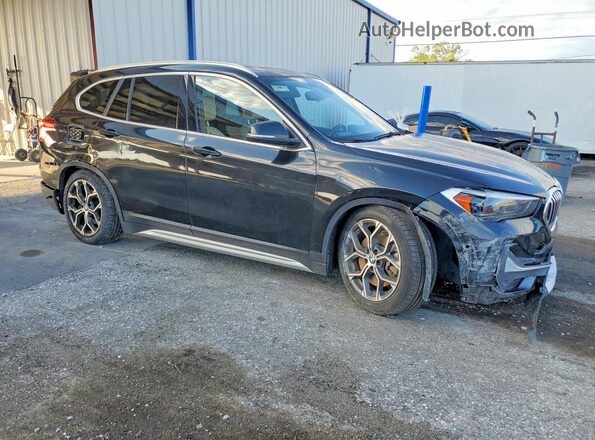WBXJG7C02M5T42579 2021 BMW X1 Black Առջևի աջ