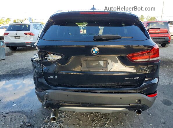 WBXJG7C02M5T42579 2021 BMW X1 Black Հետևի տեսք