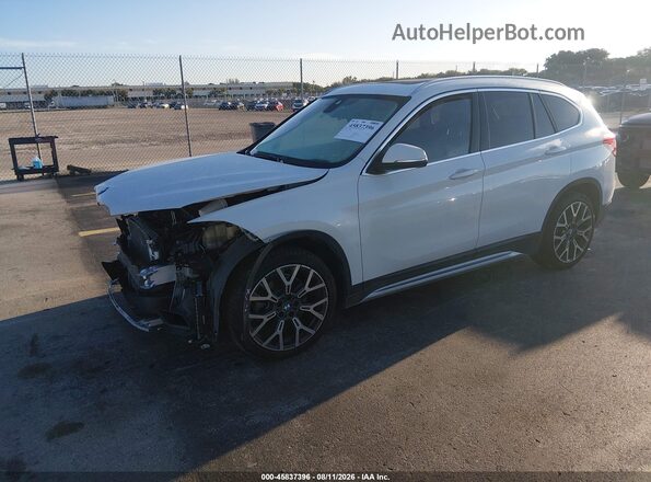 WBXJG7C03L5P67985 2020 BMW X1 Белый Передняя левая четверть