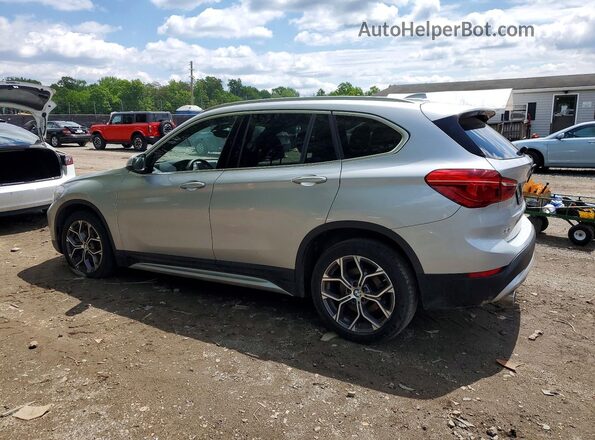 WBXJG7C03L5P72085 2020 BMW X1 Silver Trasero izquierdo