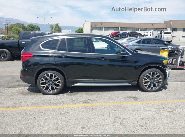 WBXJG7C03M5T30652 2021 BMW X1 Black 360 interior view