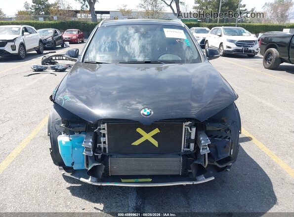 WBXJG7C03M5T30652 2021 BMW X1 Black Rear interior view