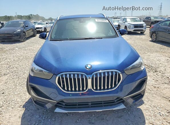 WBXJG7C06M5U25982 2021 BMW X1 Blue Vista frontal