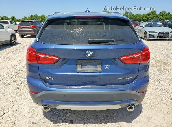 WBXJG7C06M5U25982 2021 BMW X1 Blue Vista trasera