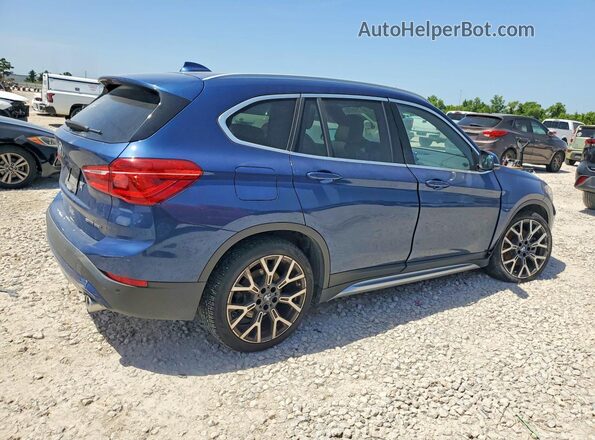 WBXJG7C06M5U25982 2021 BMW X1 Blue Trasero derecho