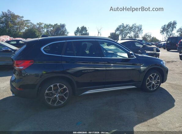 WBXJG7C06N5U57123 2022 BMW X1 Черный Вид задней части салона