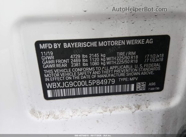 WBXJG9C00L5P84979 2020 BMW X1 White Engine compartment view