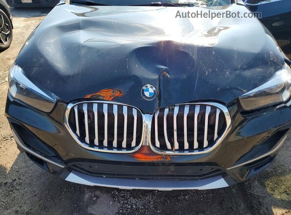 WBXJG9C01M5T31682 2021 BMW X1 Black Շարժիչի բաժամունքի տեսք