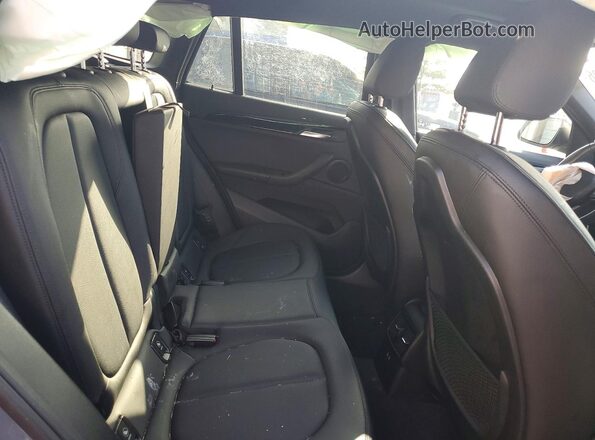 WBXJG9C02L5P23648 2020 BMW X1 Blue უკანა სალონის ხედი