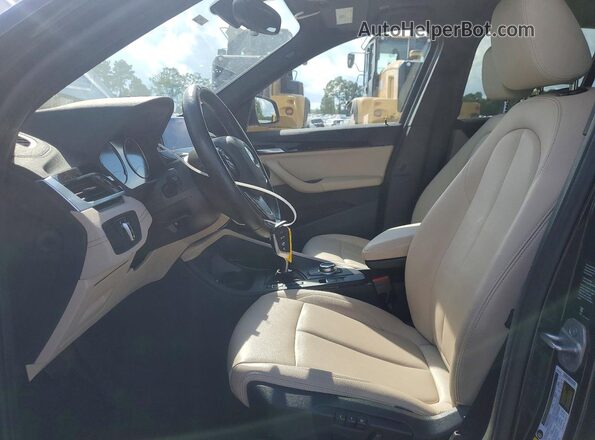 WBXJG9C04M3M74430 2021 BMW X1 Black Front interior view