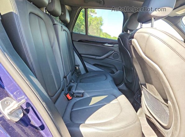 WBXJG9C05L5P84640 2020 BMW X1 Blue Սալոնի հետևի տեսք