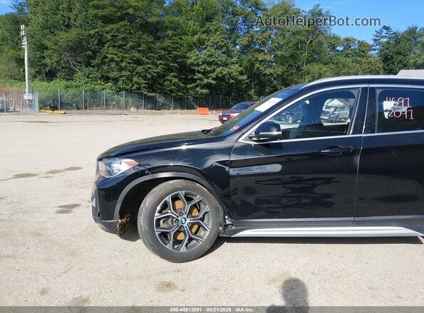WBXJG9C05M5S28099 2021 BMW X1 Черный Вид спереди