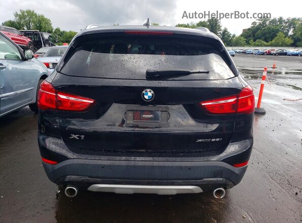 WBXJG9C07M5T73306 2021 BMW X1 Black Vista trasera