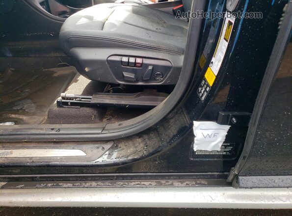 WBXJG9C07M5T73306 2021 BMW X1 Black Vista de la etiqueta del VIN