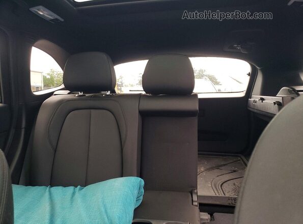 WBXJG9C07M5T73306 2021 BMW X1 Black Vista de los asientos traseros