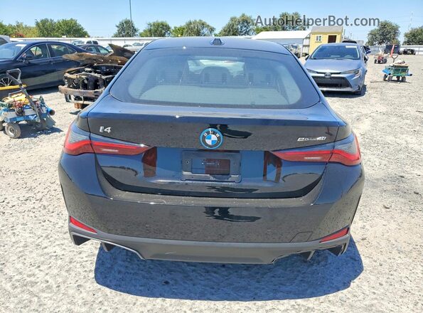 WBY23HD09SFU07676 2025 BMW I4 Black უკანა ხედი