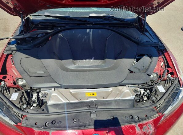 WBY23HD09SFU78084 2025 BMW I4 Red Սալոնի հետևի տեսք