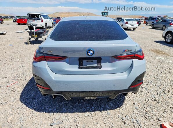WBY33AW03RFR50248 2024 BMW I4 Gray Հետևի տեսք