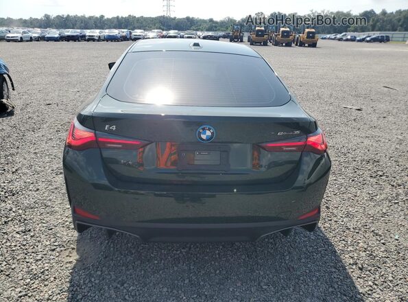 WBY43AW04RFT35325 2024 BMW I4 Black Հետևի տեսք