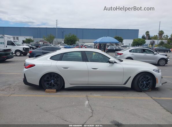 WBY43AW06RFS40717 2024 BMW I4 White Вид задньої частини салону