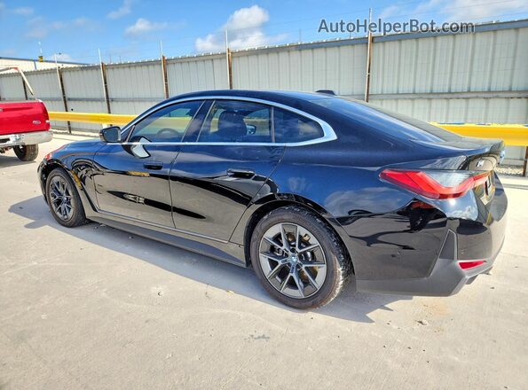 WBY43AW08PFR44530 2023 BMW I4 Black Rear left