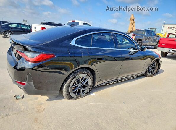 WBY43AW08PFR44530 2023 BMW I4 Black Rear right