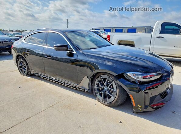 WBY43AW08PFR44530 2023 BMW I4 Black Front right