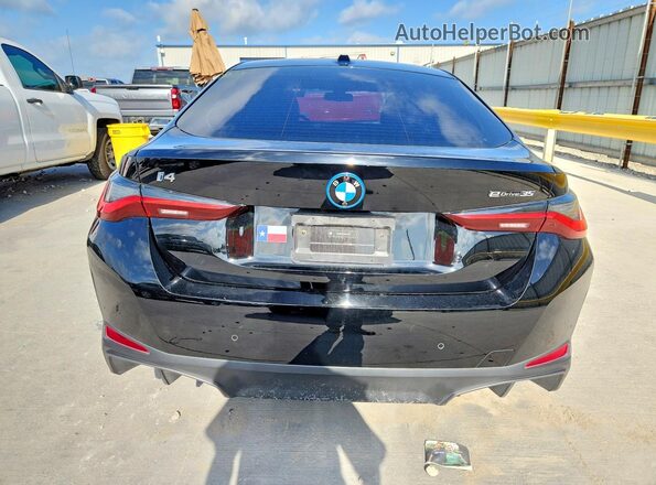 WBY43AW08PFR44530 2023 BMW I4 Black Rear view