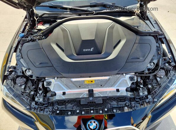 WBY43AW08PFR44530 2023 BMW I4 Black Rear interior view