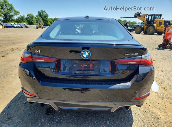 WBY73AW04RFS37411 2024 BMW I4 Black Հետևի տեսք