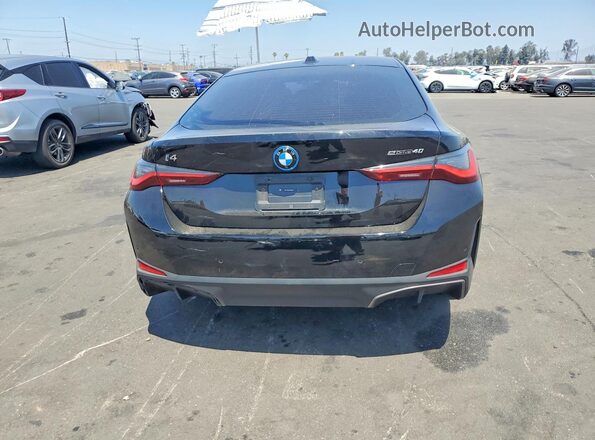 WBY73AW07RFT00954 2024 BMW I4 Black Հետևի տեսք