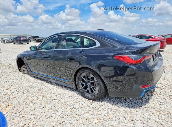 WBY73AW08RFT17861 2024 BMW I4 Black Rear left