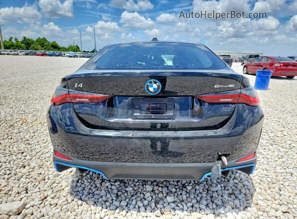 WBY73AW08RFT17861 2024 BMW I4 Black Rear view