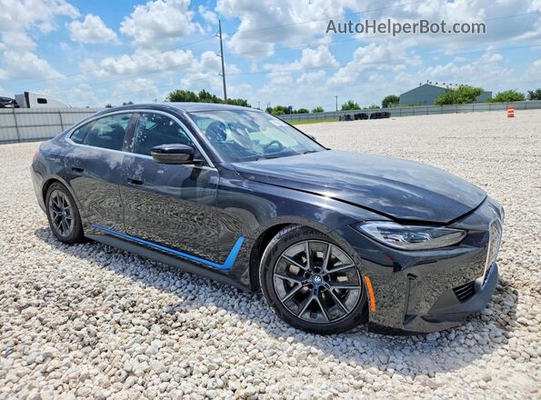 WBY73AW08RFT17861 2024 BMW I4 Black Front right