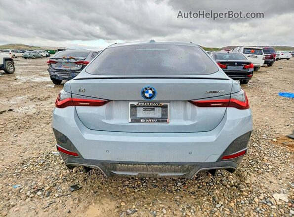 WBY83FB00RFR86097 2024 BMW I4 Gray Vista trasera